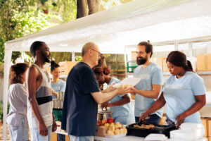 volunteers distributing free warm meals